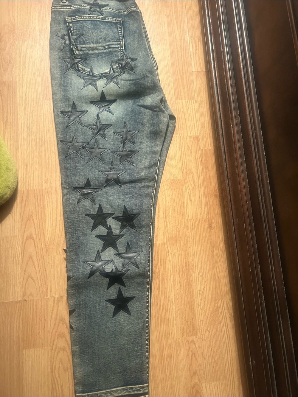 AMIRI Washed Blue Skinny Jeans with Black Star Appliqués